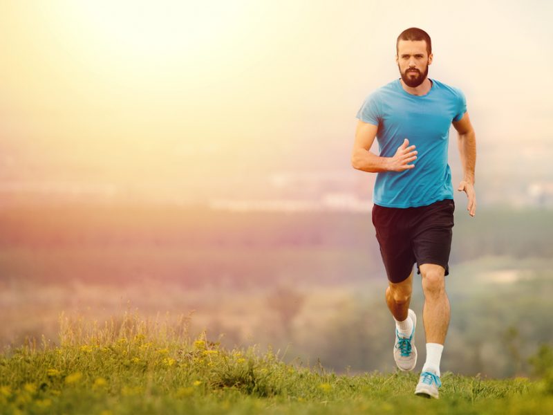 healthy man who uses Progentra taking a run outdoors